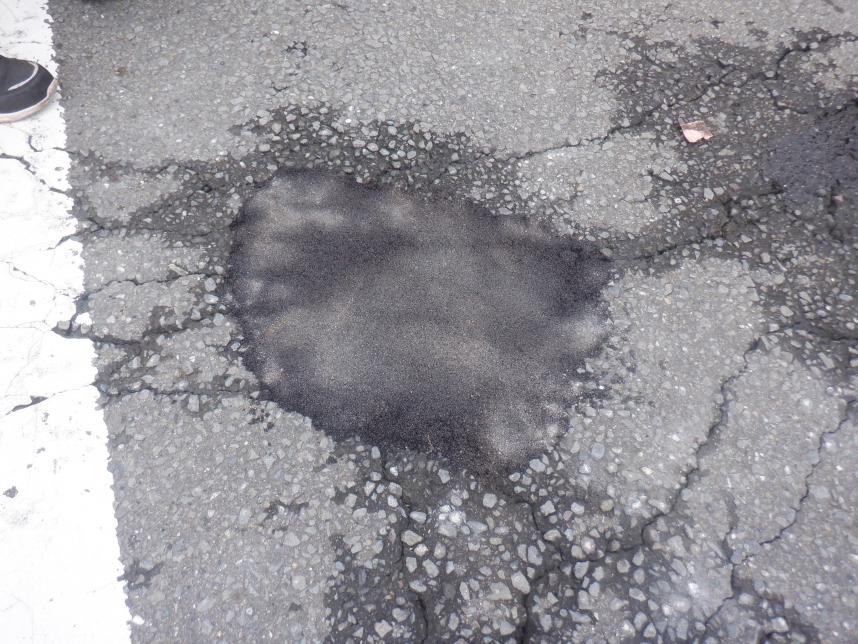 傷んだ舗装の補修後の写真